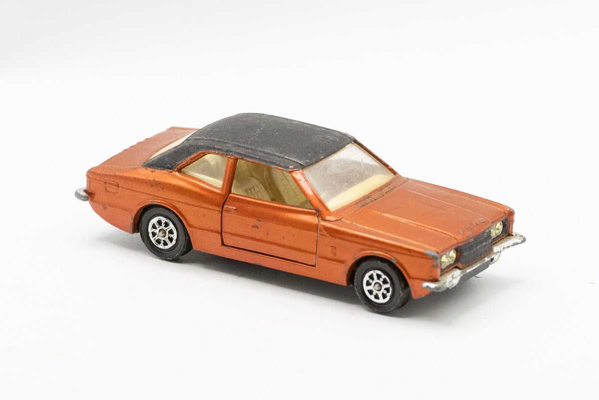 Playworn vintage Corgi 313 Ford Cortina GXL MK3 Graham Hill model car, bronze with black roof, unboxed.
